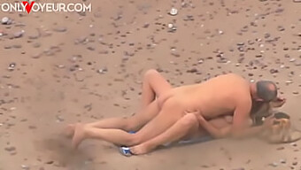 Mature Man And Teen'S Public Rendezvous On The Beach