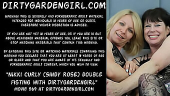 Dirtygarden girl and Nikki Curly (aka Sindy Rose) engage in extreme lesbian fisting with two big prolapse anus holes