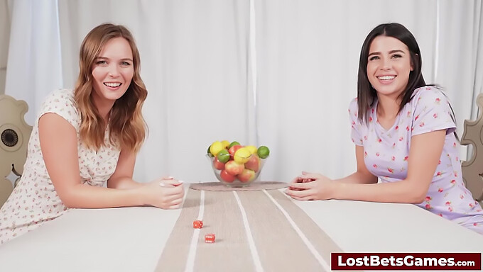 Two stunning women strip down after a fun game