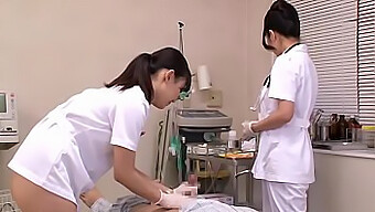 Japanese Nurses Attend To Their Patients In A Medical Setting