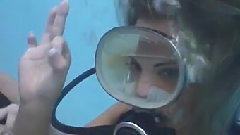 A Scuba Diver Receives A Facial Finish Inside Her Mask